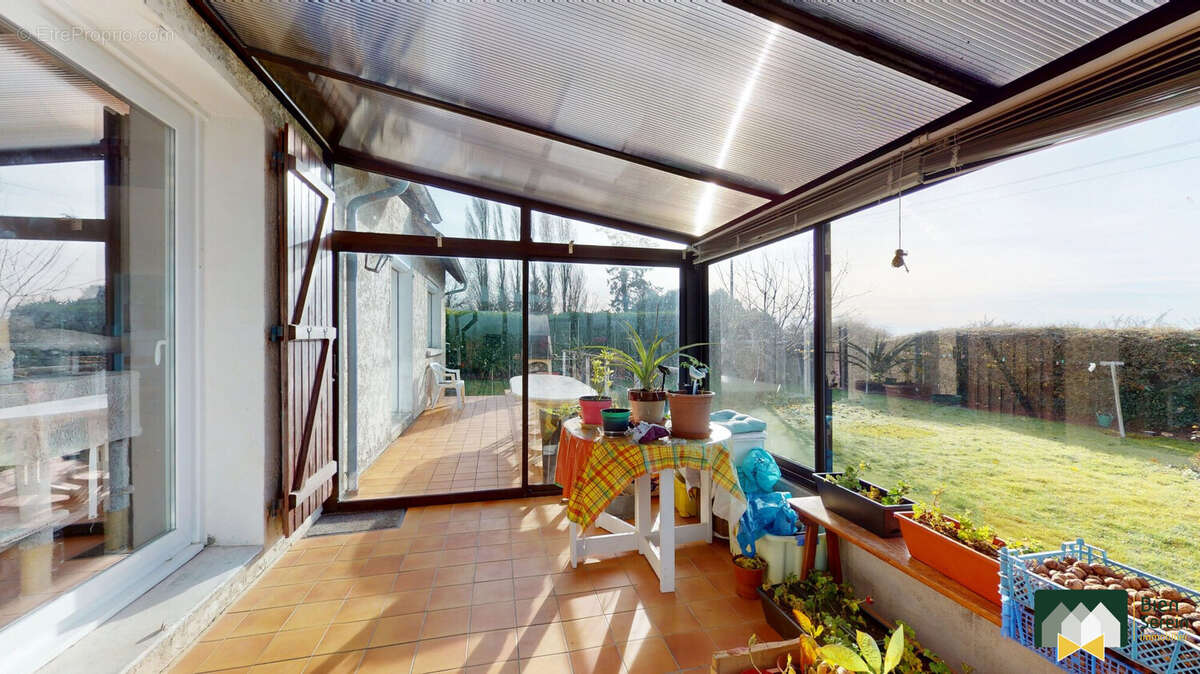 Véranda  - Maison à UMPEAU