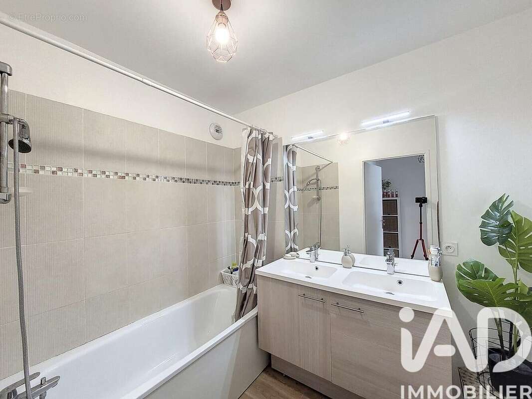 Photo 7 - Appartement à LA COURNEUVE