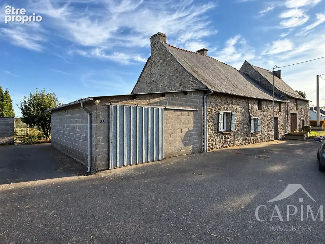 Maison à COMBOURTILLE