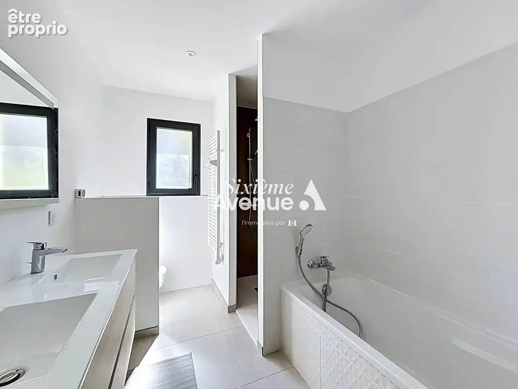 Maison récente Decines-Charpieu 4 pièce(s) 102.01 m2 plain-pied - photo 8