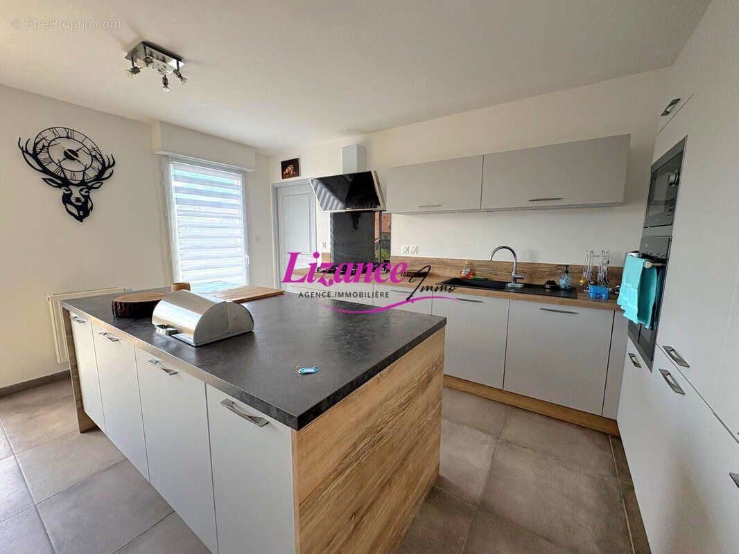 Maison 107 m² à Raillencourt-Sainte-Olle  - photo 3