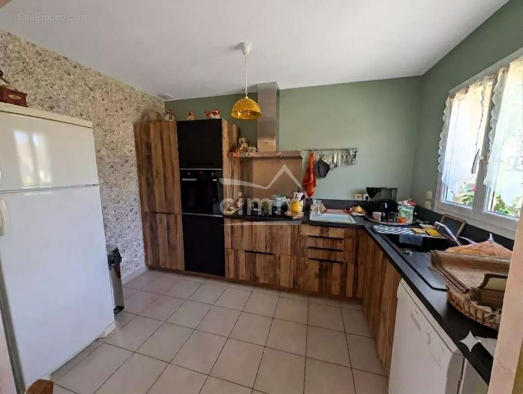 Maison T5 avec Jardin 1035 m² - photo 4