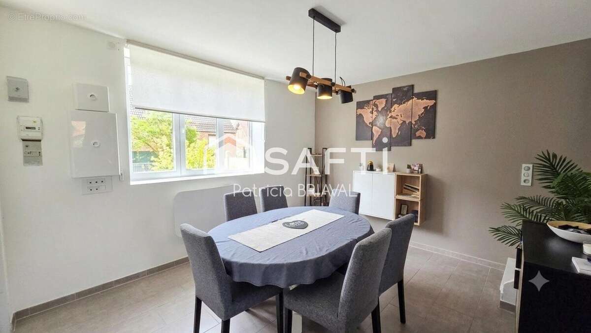 Maison 69 m² à Sains-En-Gohelle  - photo 2