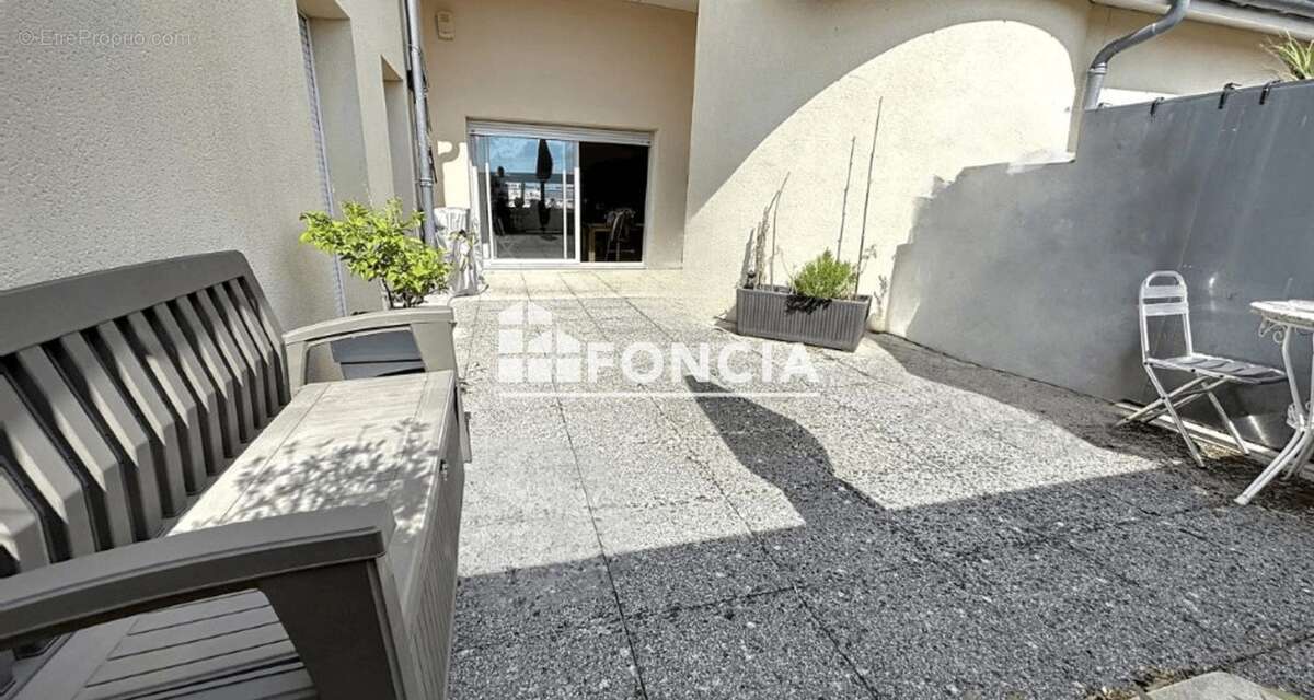 SAINT MICHEL : T4 avec terrasse, cave et grand garage - photo 3