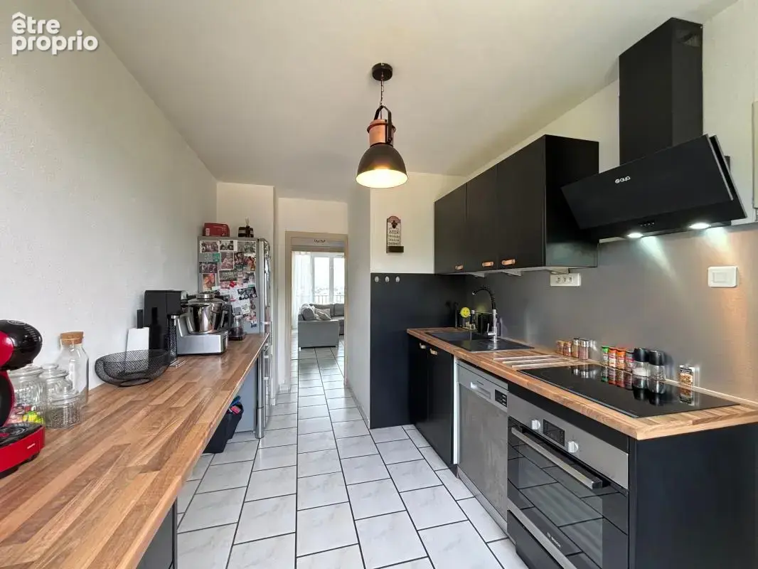 Appartement T4 de 75 avec balcon et cave - photo 3