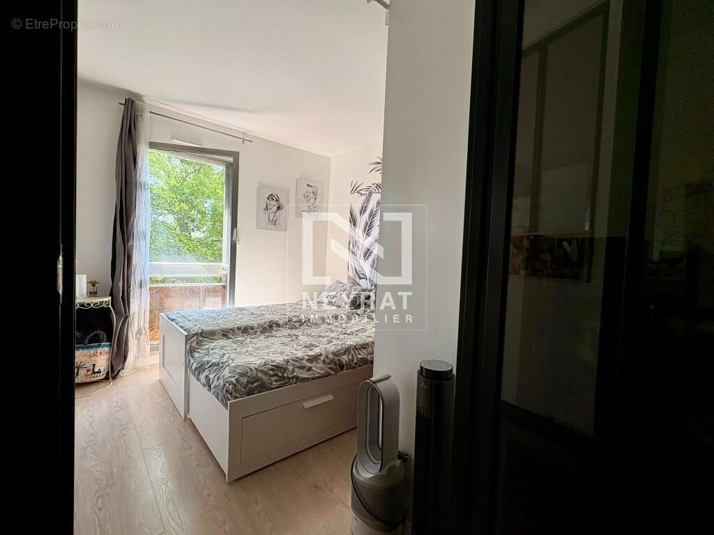 Appartement avec balcon, cave et garage privatif - Environnement verdoyant - Quartier Wilson / Allées du parc - photo 7