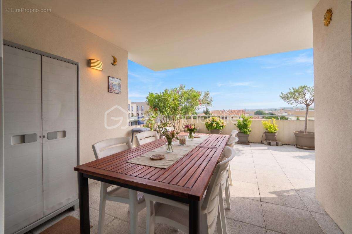 NÎMES CAPOUCHINÉ – Superbe T4 de 96 m² avec Terrasse d'Exception de 57 m² ! - photo 4