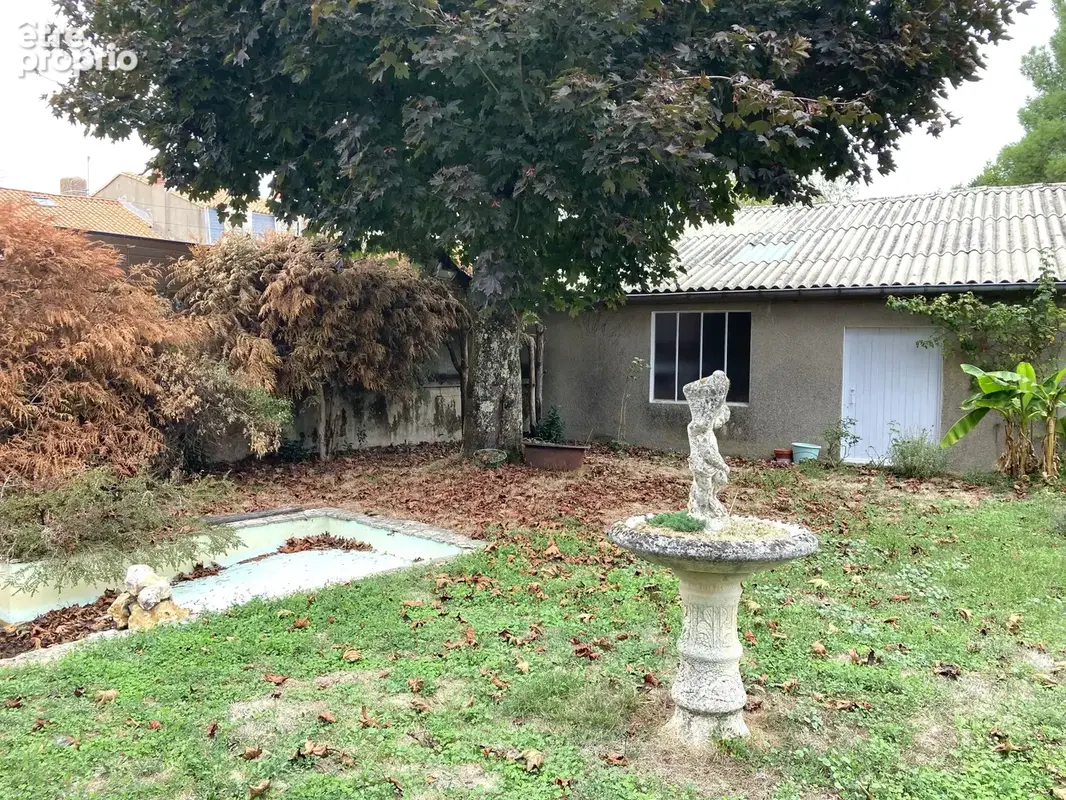 Belle Maison de Maître en centre ville avec jardin et garages - photo 13