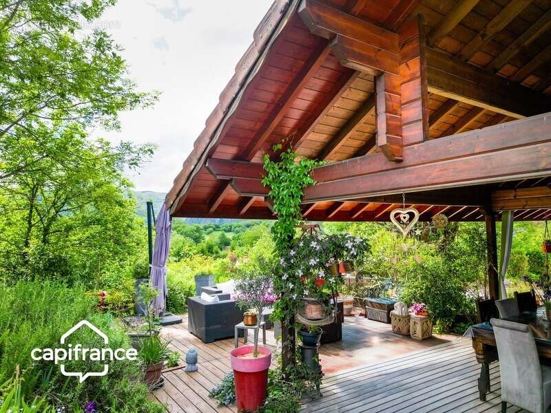 01300 cuzieu maison bois massif type chalet, 146 m² ,plain-pied terrasse, garage,piscine, terrain 1100 m2 - photo 11