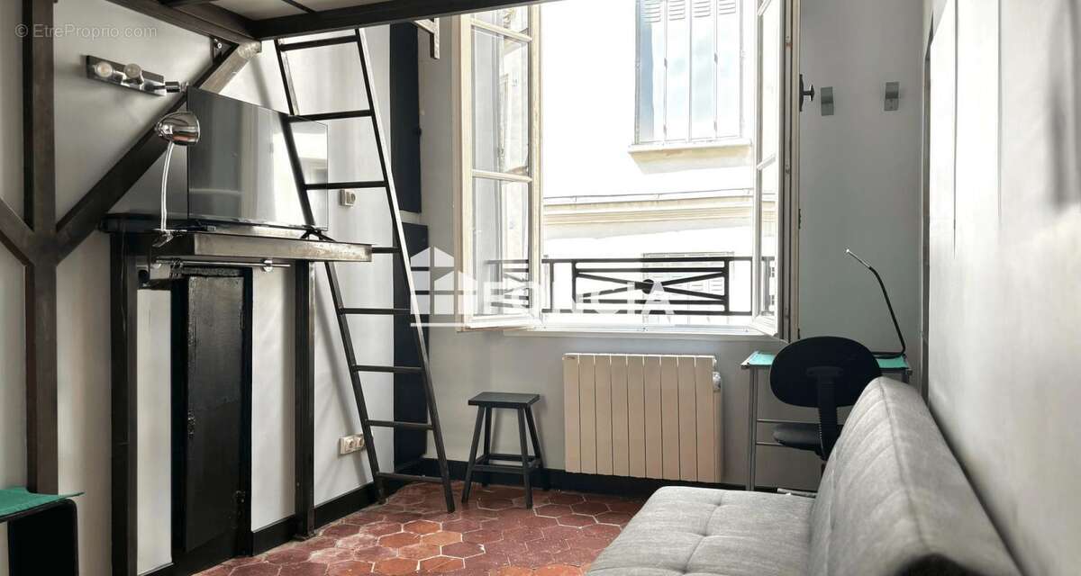 Paris ii - studio lumineux avec superbe hauteur sous plafond - photo 3