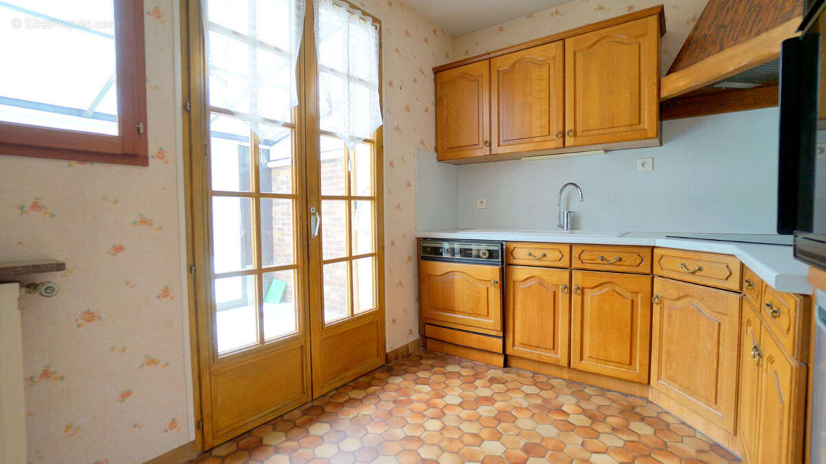 Maison à AUBERGENVILLE
