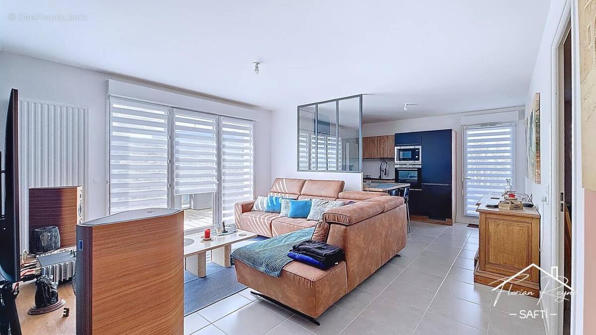 Photo 1 - Appartement à PAREMPUYRE