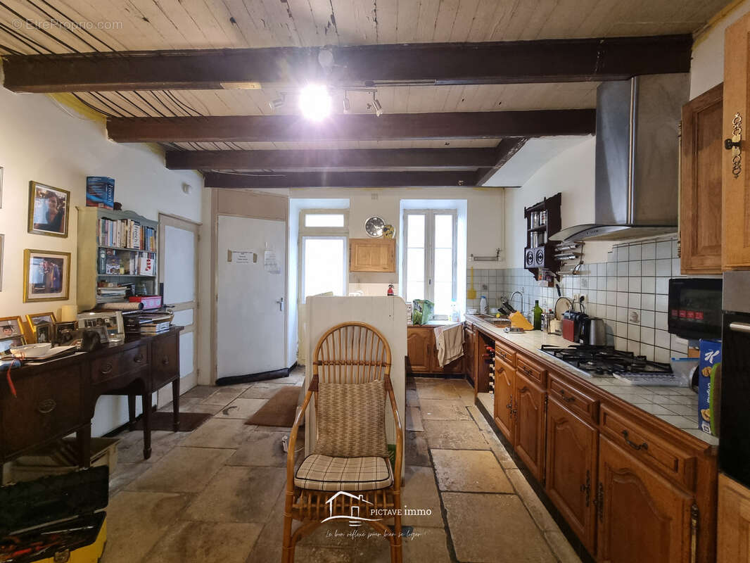 Maison à MENIGOUTE