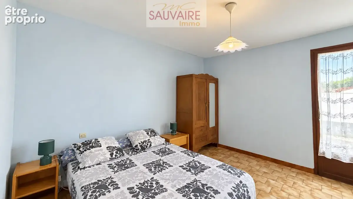Maison de plain-pied avec jardin et garage - photo 9