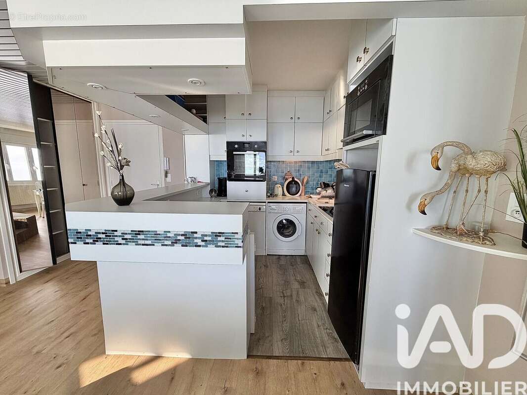 Photo 5 - Appartement à AGON-COUTAINVILLE