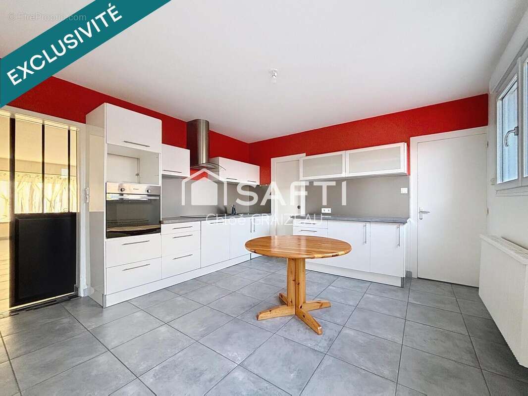 Photo 2 - Maison à LA CHAPELLE-SAINT-LAURENT