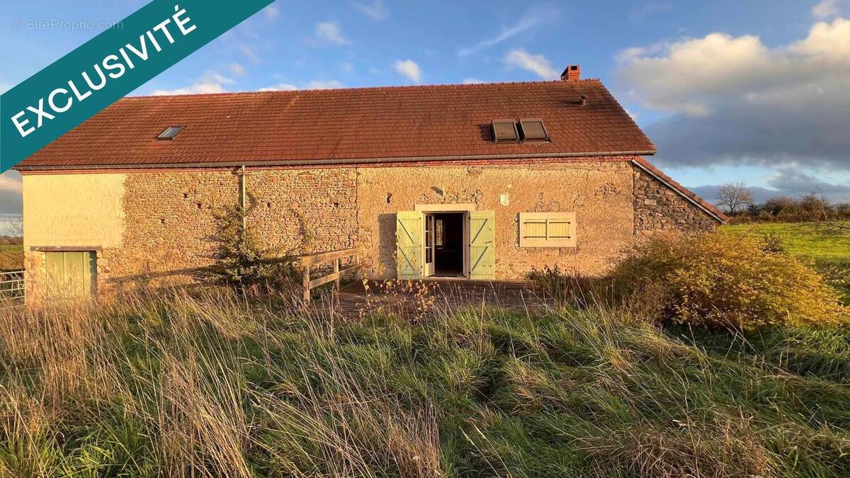 Photo 1 - Maison à ECHASSIERES