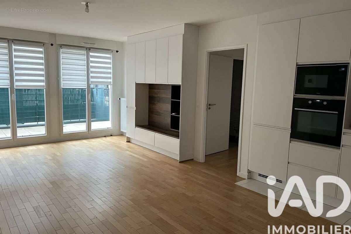 Photo 3 - Appartement à VOISINS-LE-BRETONNEUX