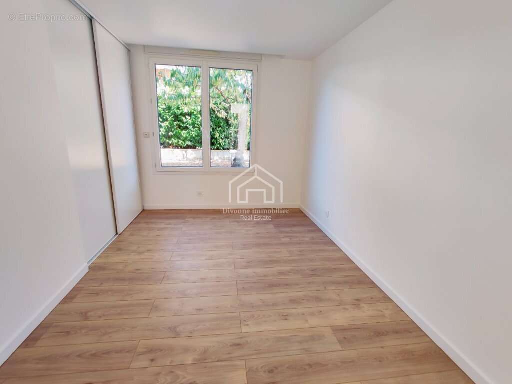 Magnifique appartement en rez de jardin rénové à neuf - photo 2