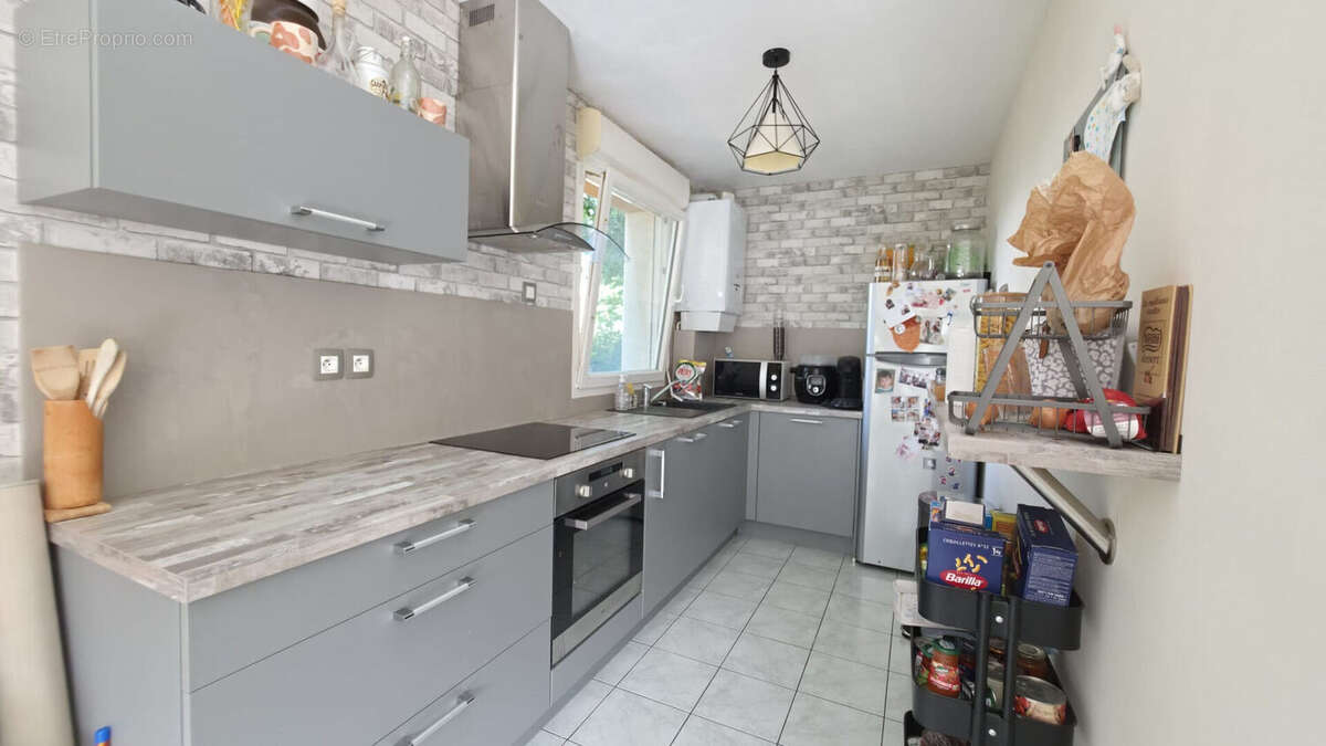 Appartement Le Rheu 4 pièces 82 m2 - photo 4
