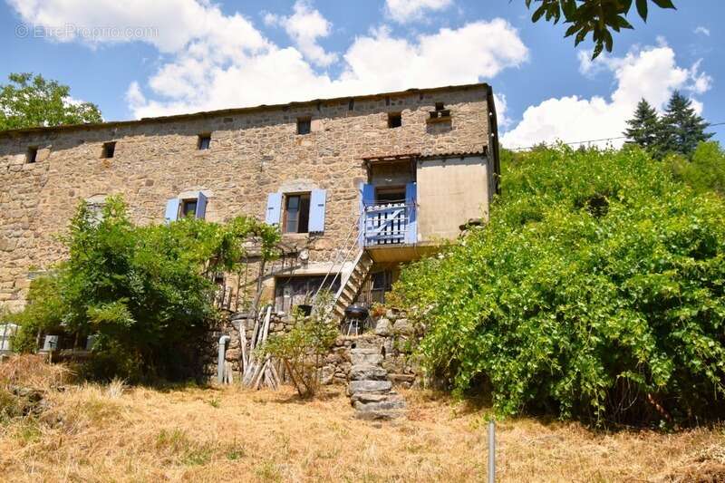 Petite ferme en pierres avec terrain SAINT-JULIEN-D'INTRES (07) - photo 7