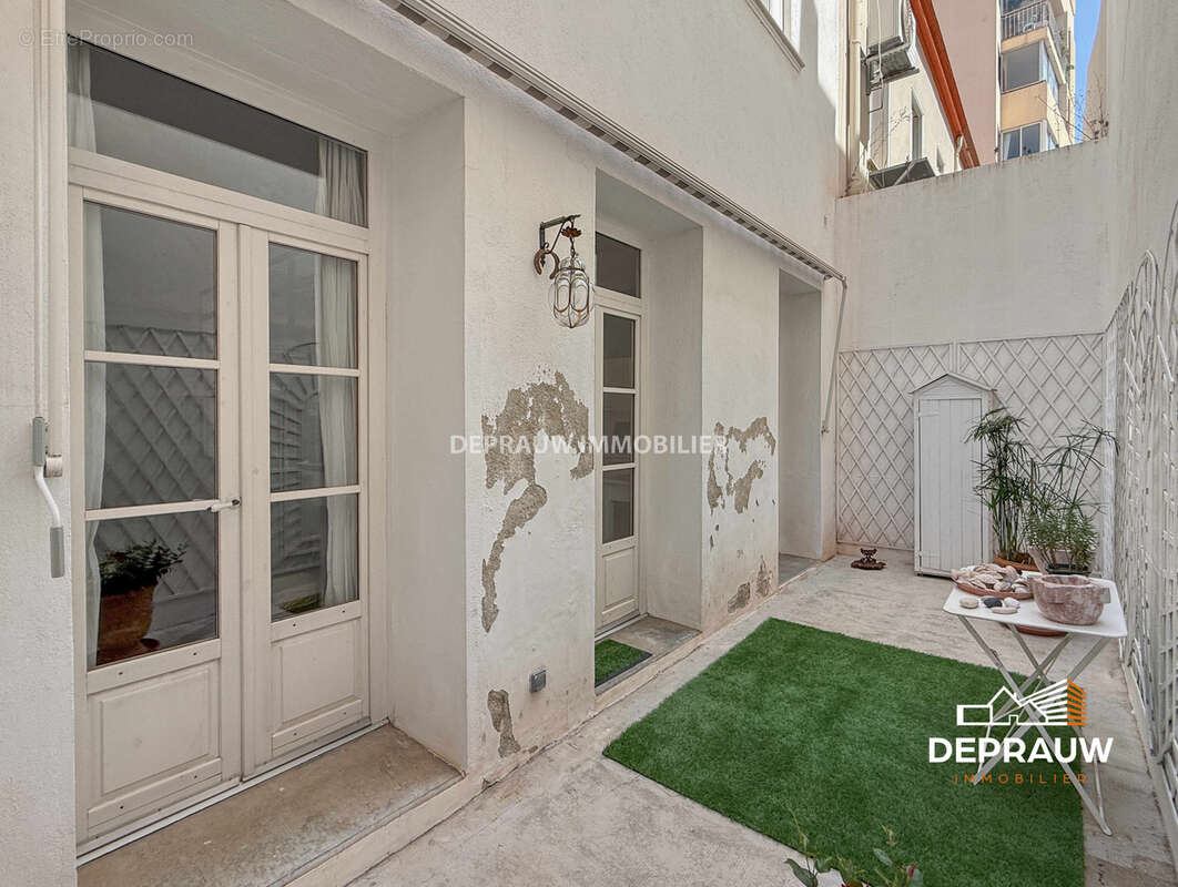 Élégante demeure de caractère de 160 m2 avec jardin arboré de 100 m2 - photo 8