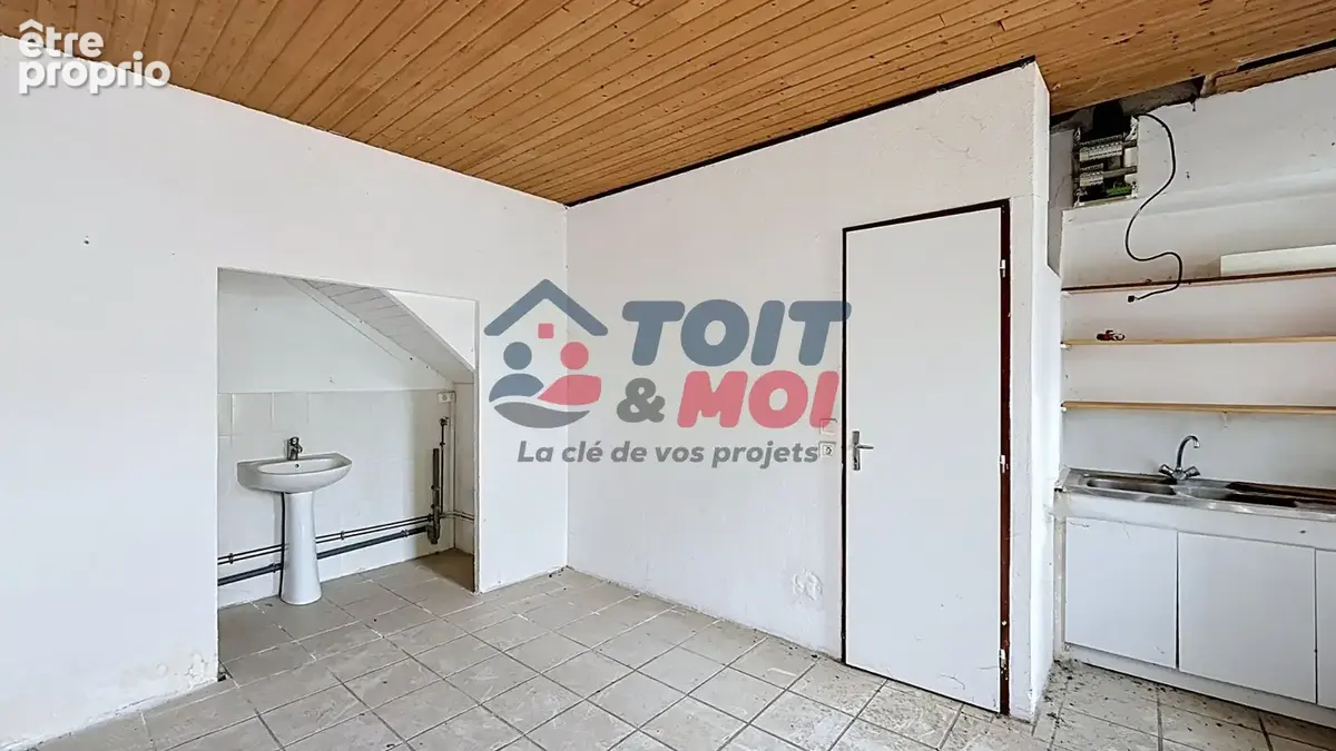 Immeuble avec appartement habitable et fort potentiel locatif - photo 8