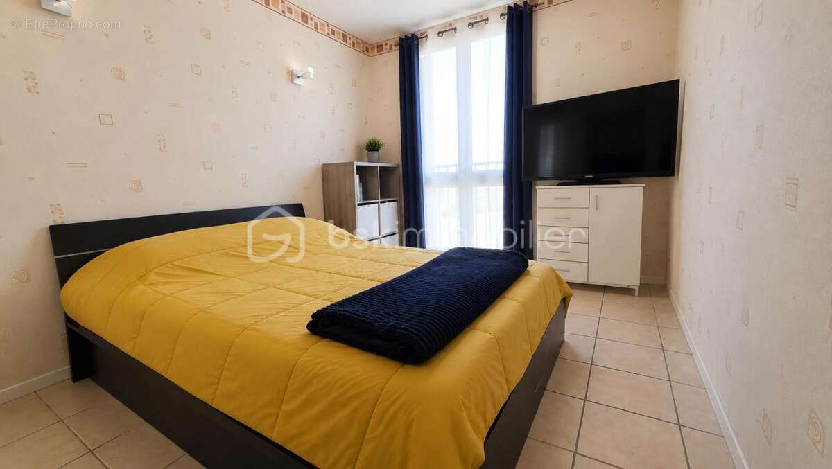 Appartement F3 - 67 m2 - 2 chambres - cave et parking - photo 3
