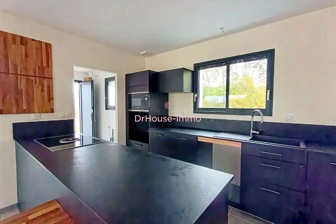Maison à GAN