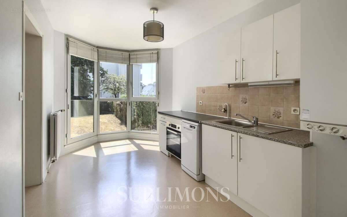 Appartement T3 avec jardin - photo 4