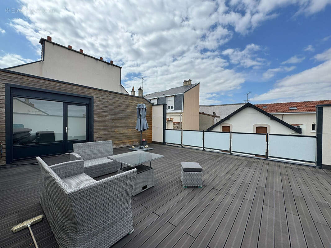 Maison récente avec terrasse et garage - proche centre-ville - photo 11