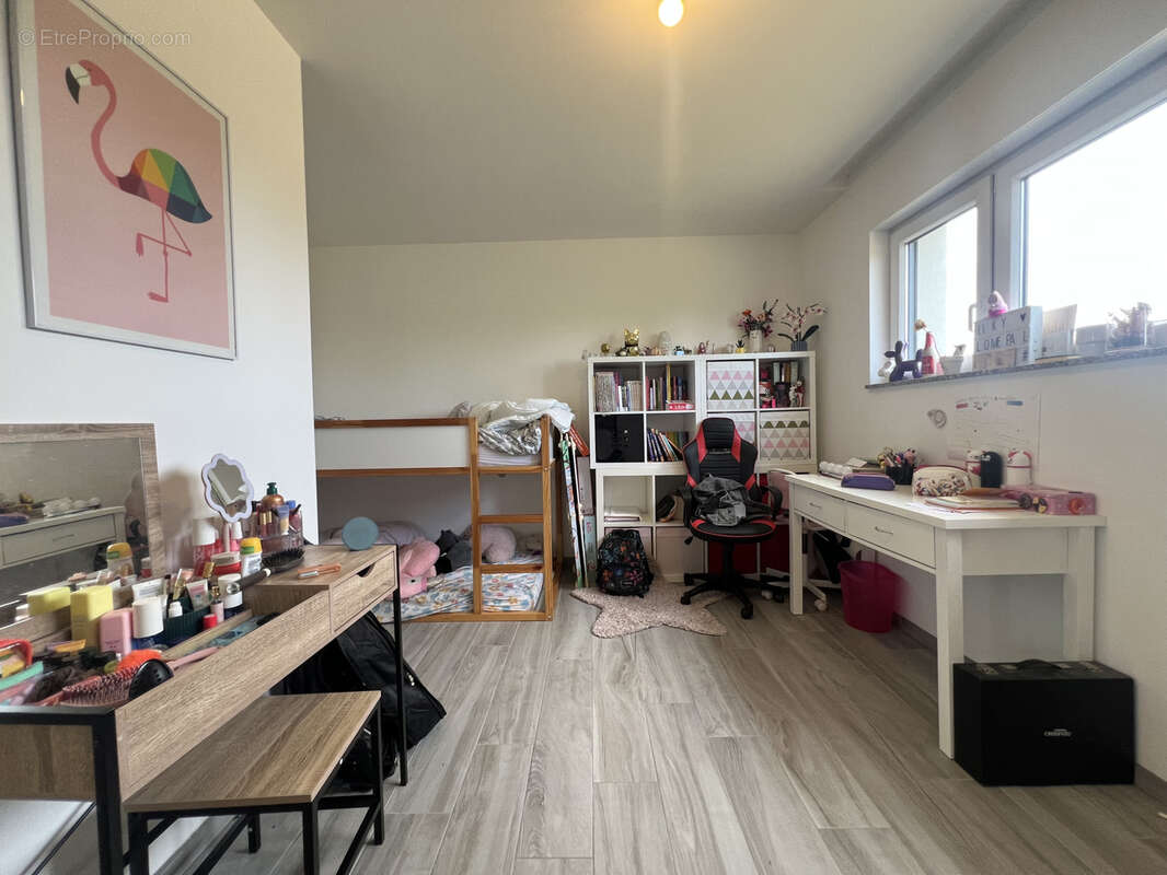 A Bischwihr, une superbe maison individuelle à toit plat 5 pièces de 125 m2 de 2020 de surface habitable sur u - photo 14
