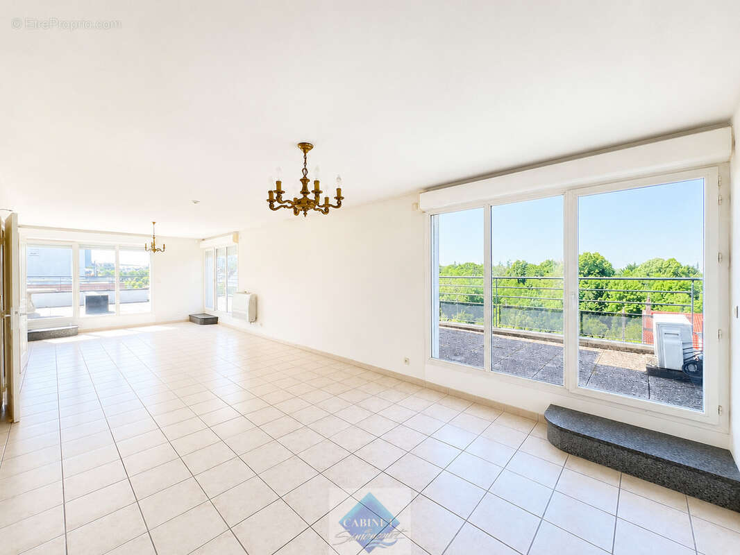 Appartement terrasse t4 - 117m2 - clim-ascenseur-box-parking-cave - photo 2