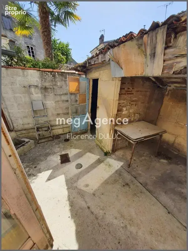 Maison avec patio et petit garage en centre ville - photo 7