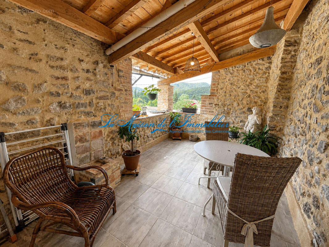 A proximité de Gagnières au calme maison de village en pierre de type F3 avec 653m2 de terrain. - photo 7