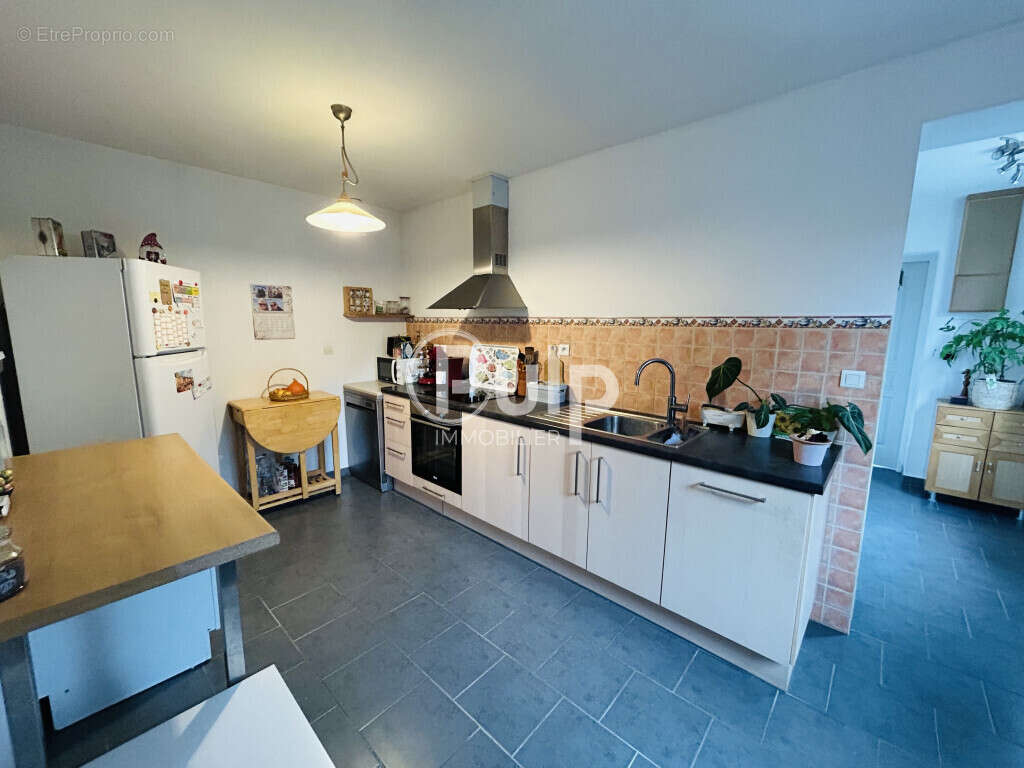 Maison à OSTRICOURT