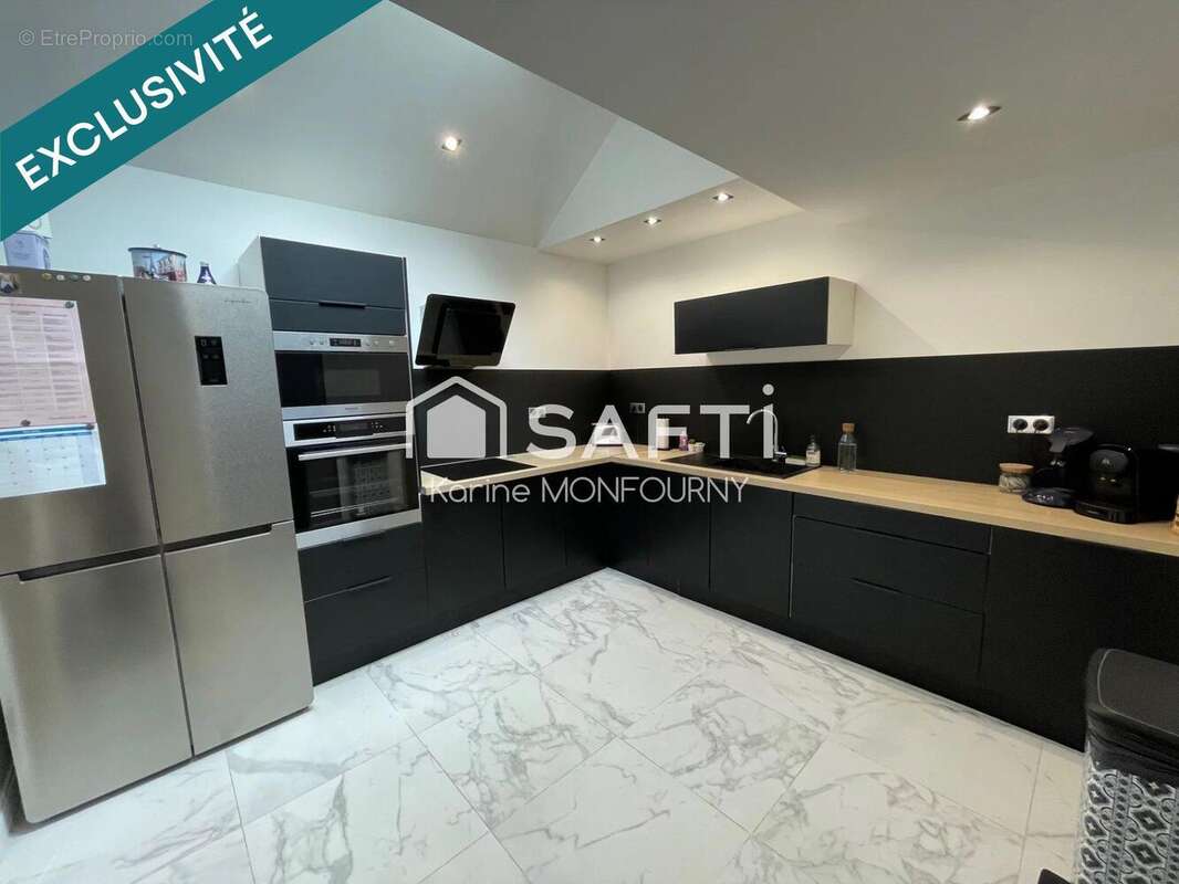 Photo 3 - Maison à SAINT-QUENTIN