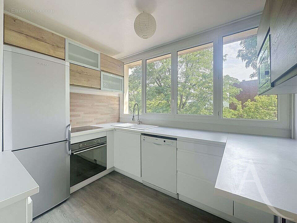 EXCLUSIVITÉ - Appartement F3 56 m² avec balcon, 2 chambres, cave et cuisine équipée - photo 7