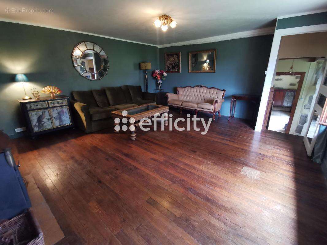 Maison à JUVIGNY-LE-TERTRE