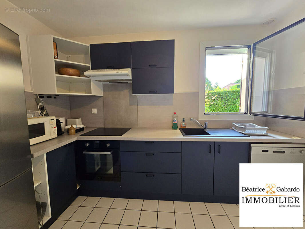Maison St Genis Laval 5 pièce(s) 130  m² - photo 10