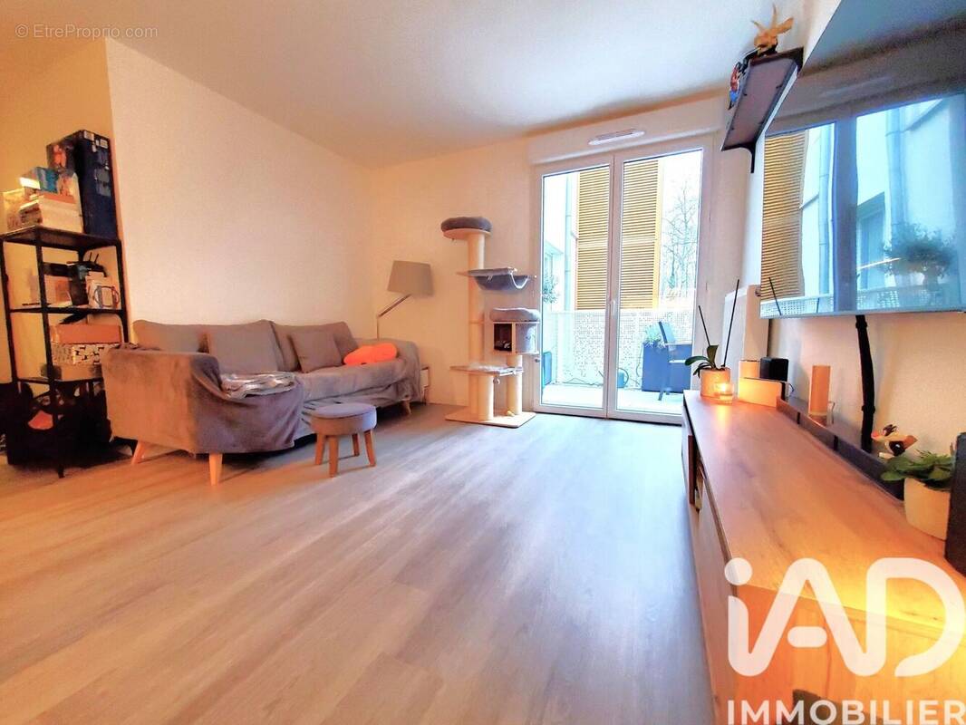 Photo 1 - Appartement à VOISINS-LE-BRETONNEUX