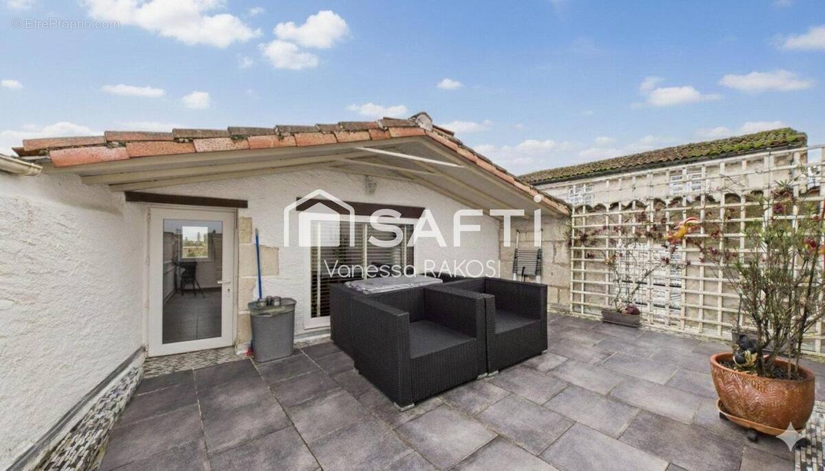 Photo 1 - Maison à SAINTES