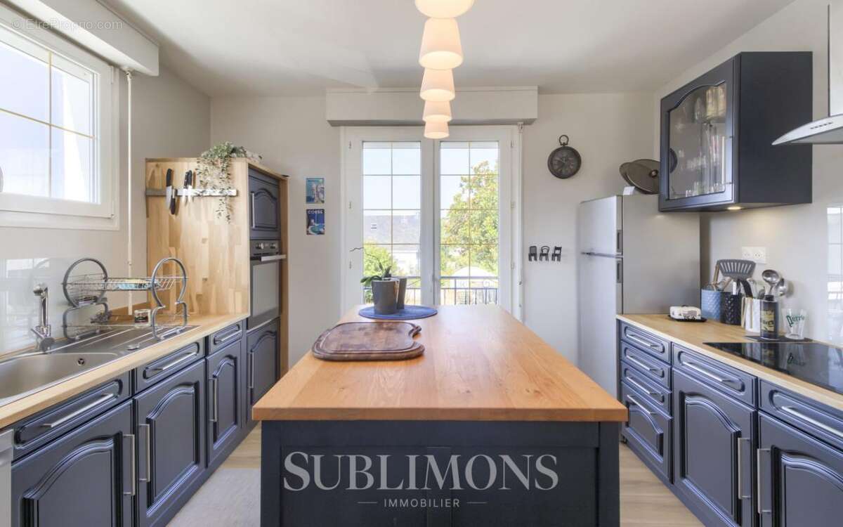 Maison rénovée de 145 m² - Kervignac (centre-bourg) - photo 4