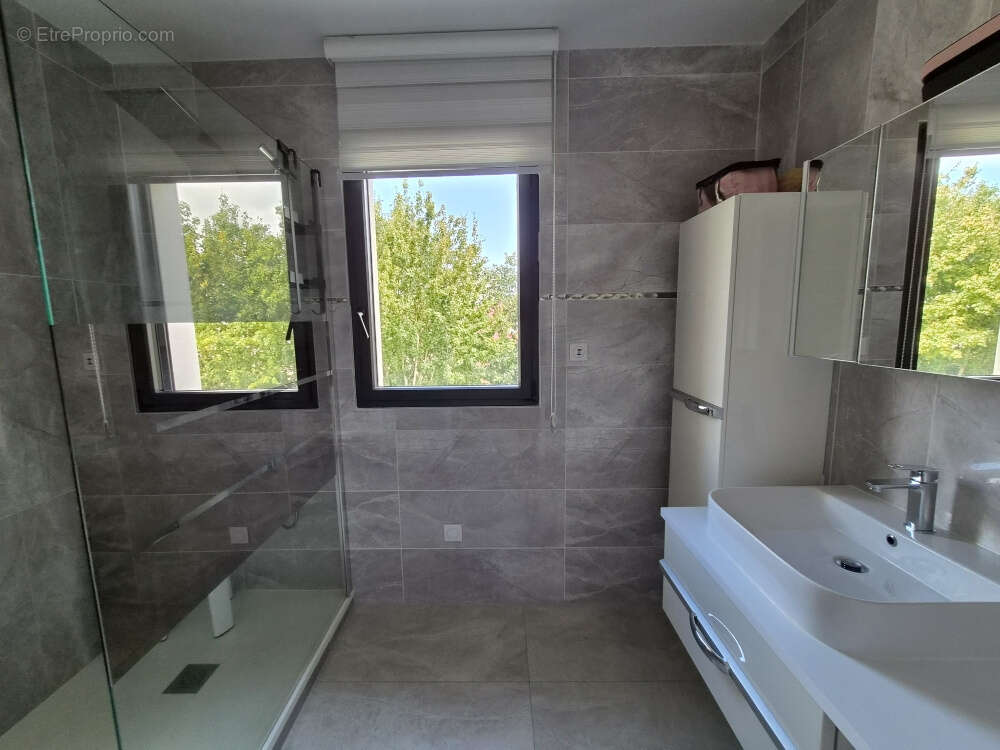 Maison moderne de 173 m2 habitables - photo 12