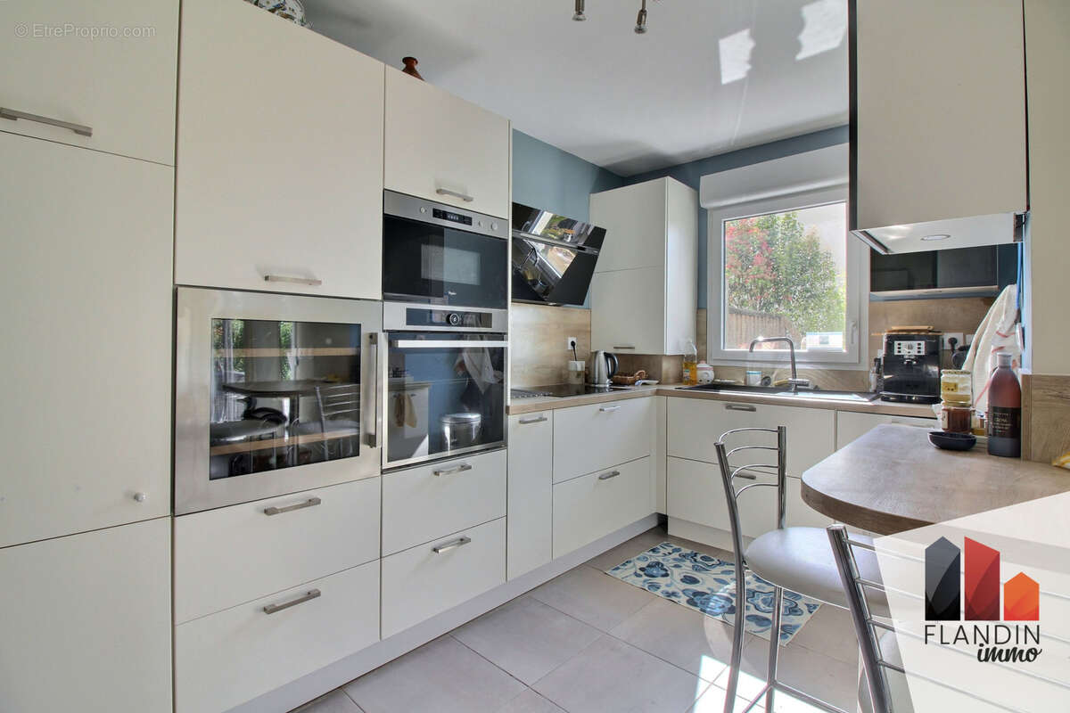Appartement de standing de 93 m2 avec jardin, terrasse et vue sur les Monts du Lyonnais - photo 6