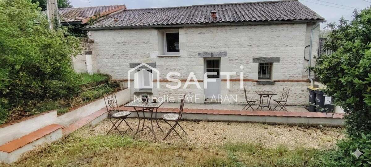 Photo 2 - Maison à SAINT-GENEST-D'AMBIERE
