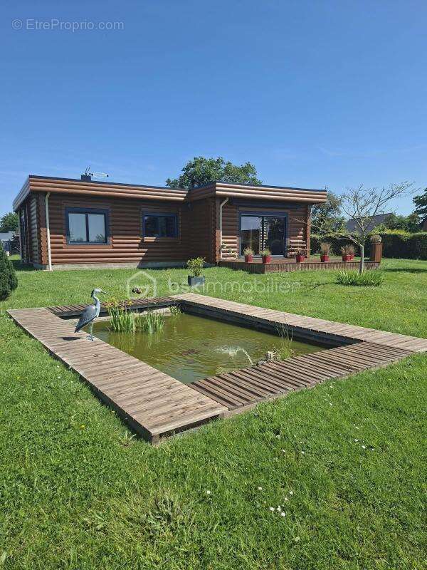 Maison en rondins de bois - photo 2