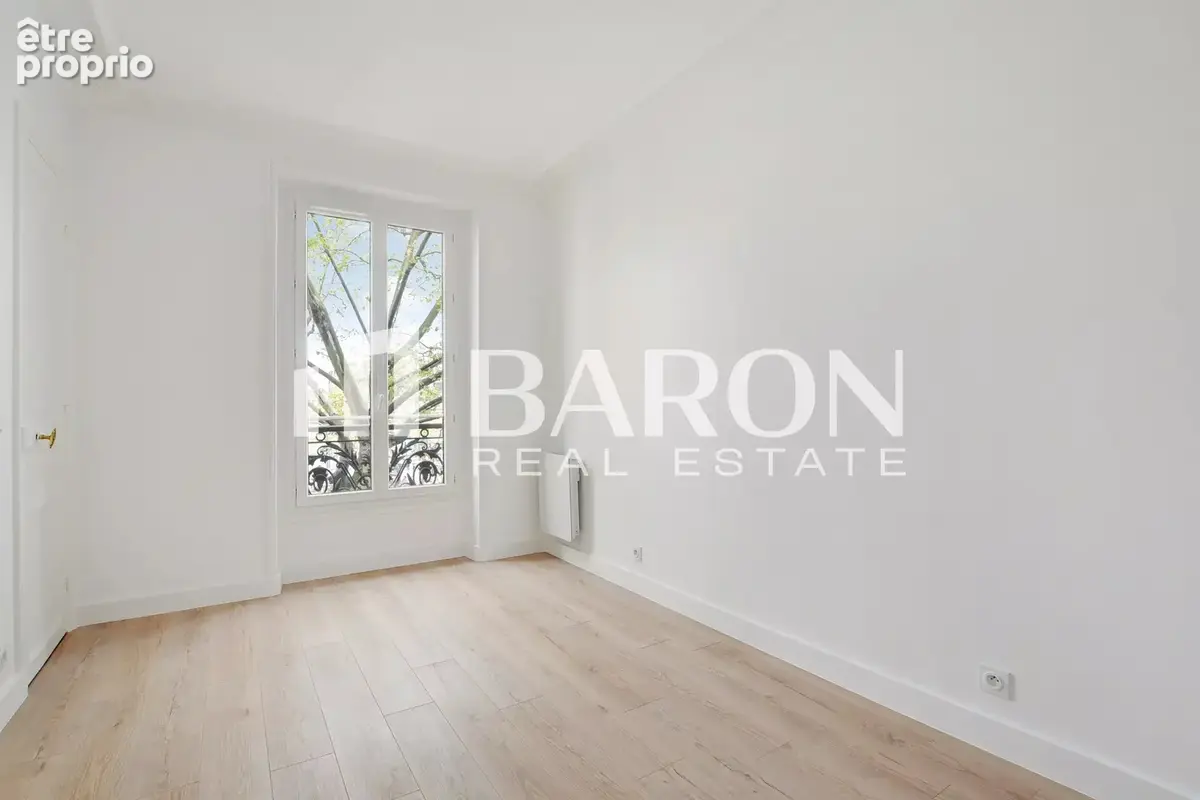 Paris xviii - appartement 3 pieces 1 chambre 55 m2 - photo 4