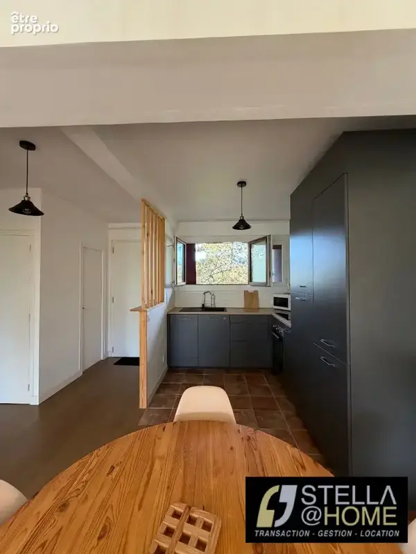 T2 traversant au sein d'une copropriété verdoyante - photo 9