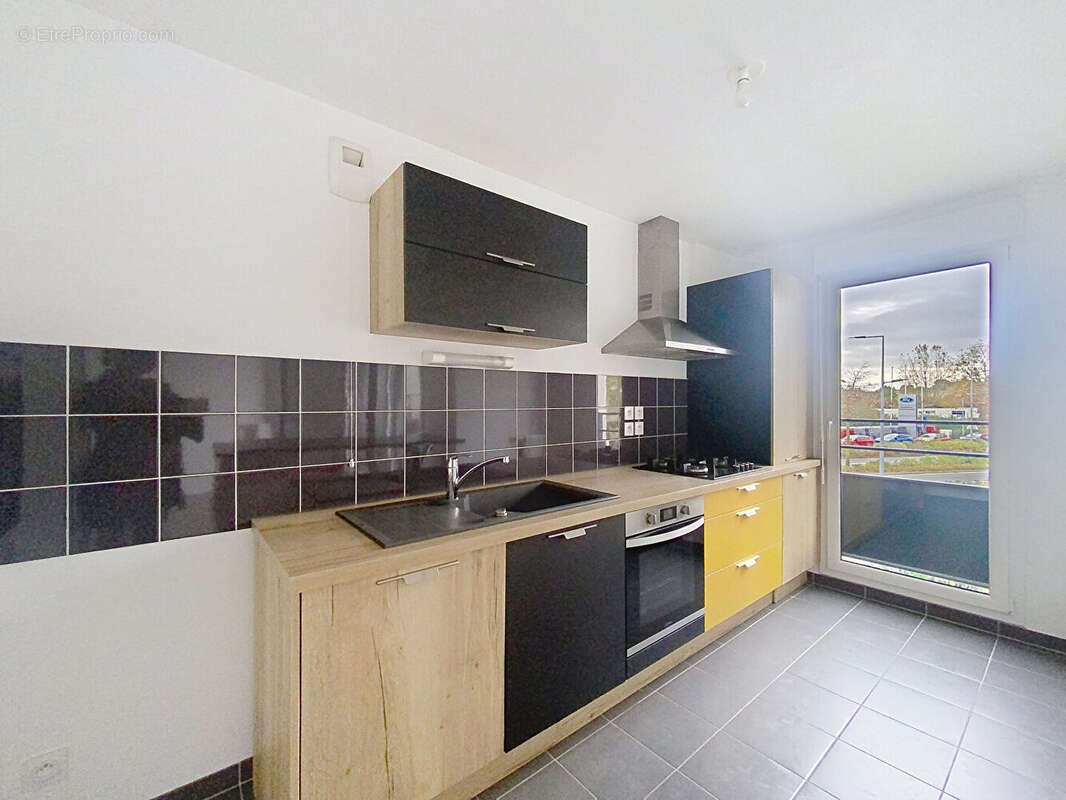 Appartement t3 avec ascenseur grand garage proche commerces et ecoles - photo 4